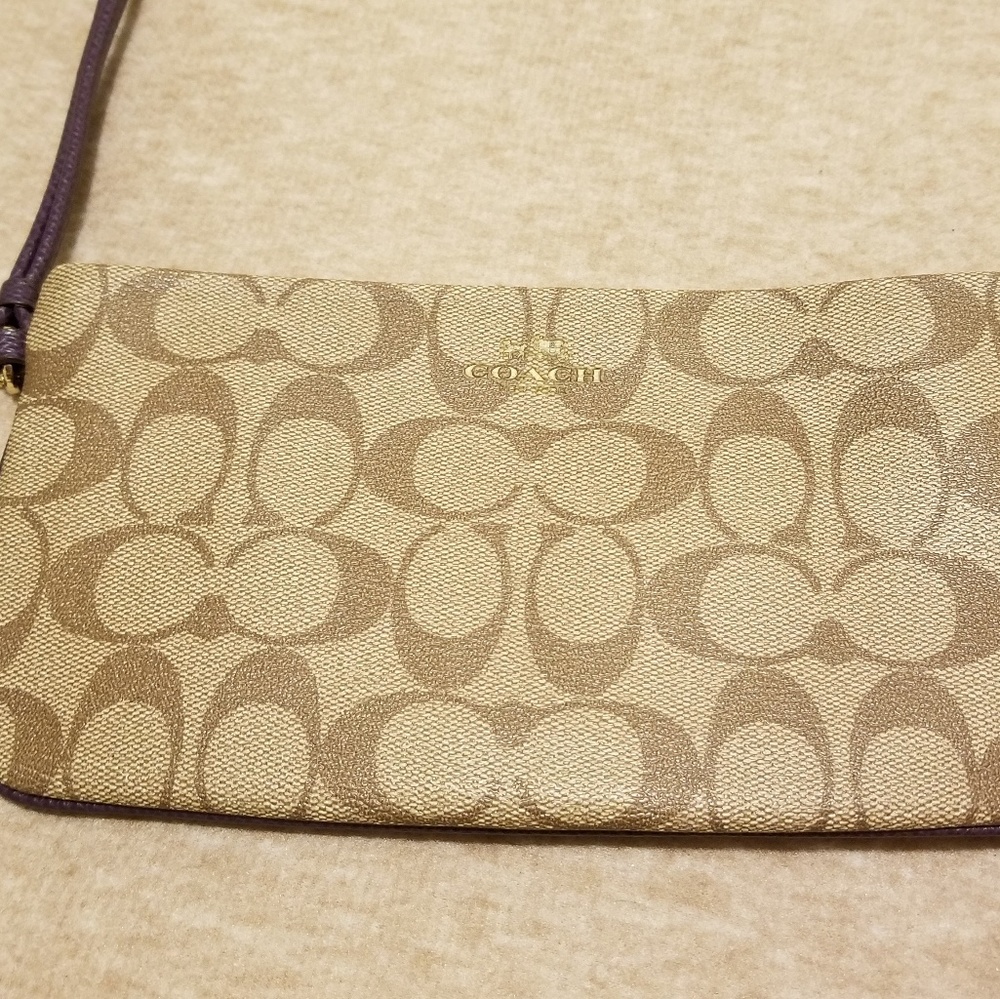 Tan Coach wristlet